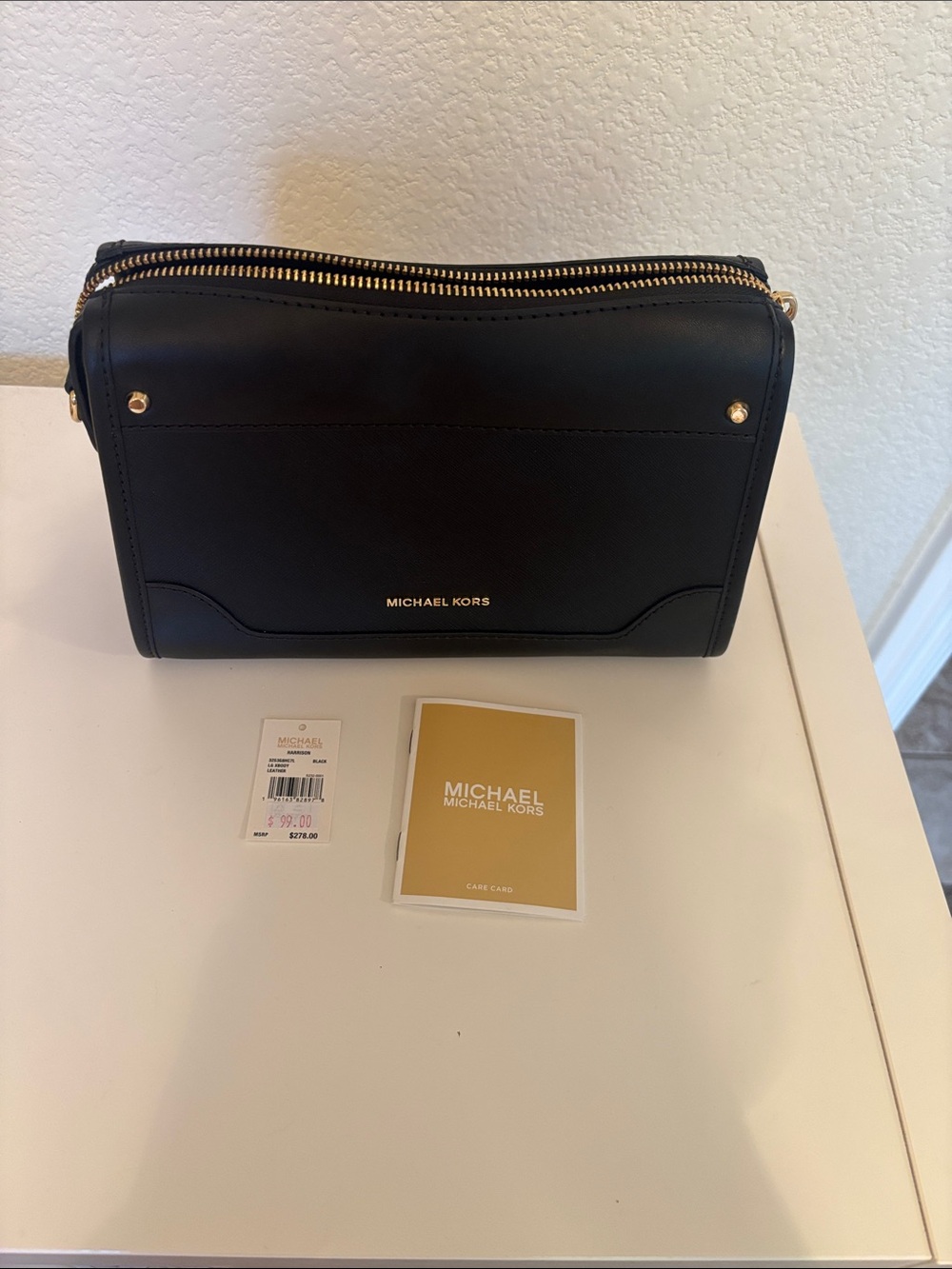 Michael Kors Black Leather Zip-Around Men's Wallet with Gold Accents